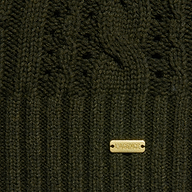 Close-up of the Mio Cabled Pullover, a dark green crewneck sweater crafted from a cotton-blend knit with ribbed and cable patterns. A gold metal tag engraved with LAGENCE accents the design.