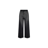 Gaelle Pointelle Knit Pant in black, featuring a wide-leg silhouette with a sheer, lacy zigzag pointelle knit pattern and an elastic waistband, shown against a plain white background.