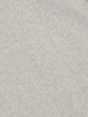 Close-up of the Guinevere Cropped Pullover by L'AGENCE, featuring textured white knit fabric with diagonal lines and a slightly rough, woven look—ultra-soft and perfect for a cozy, stylish sweater.