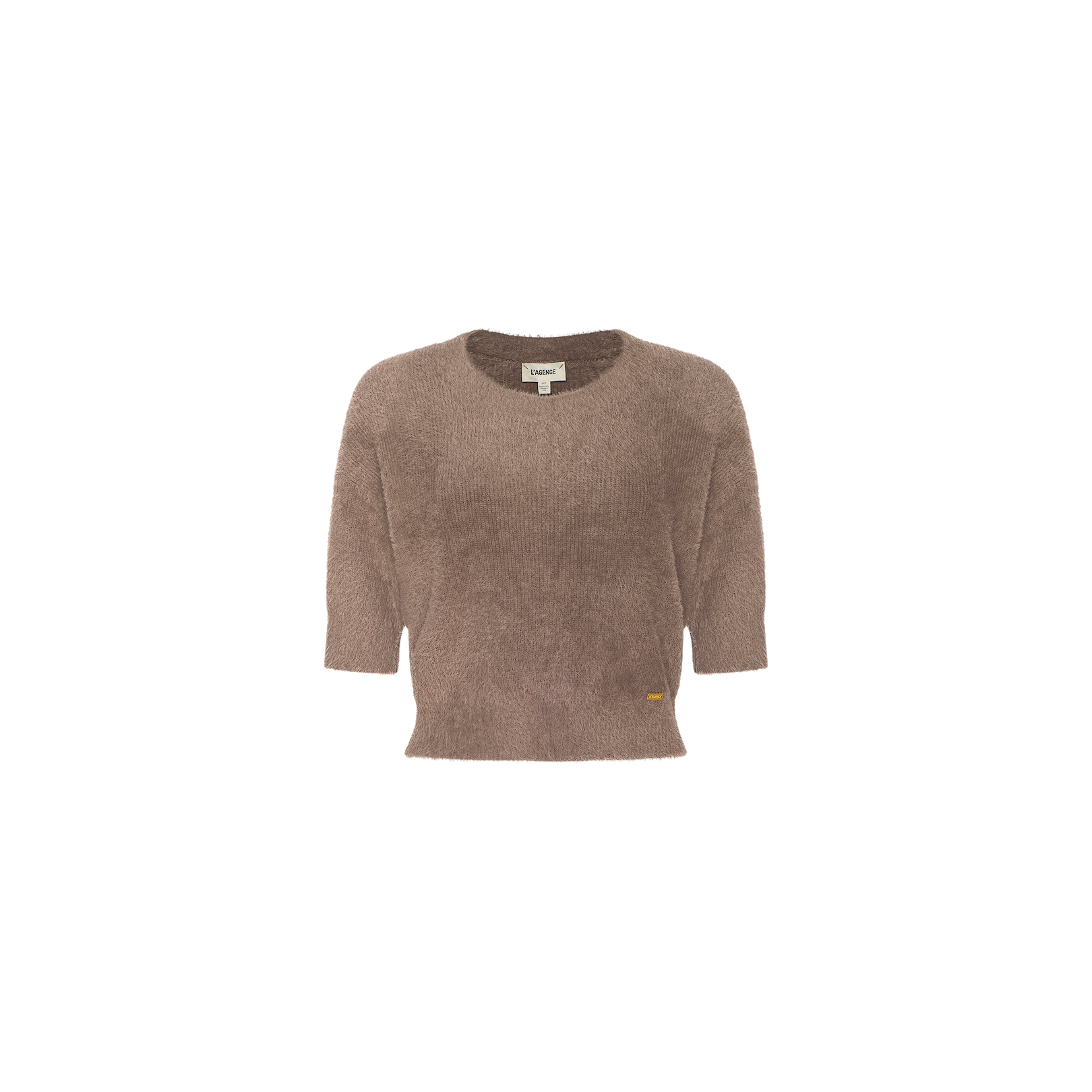Light brown Guinevere Cropped Pullover, an ultra soft knit short-sleeve crewneck sweater with a fuzzy texture and round neckline, displayed on a plain white background. A small tag is visible near the bottom hem on the left side.