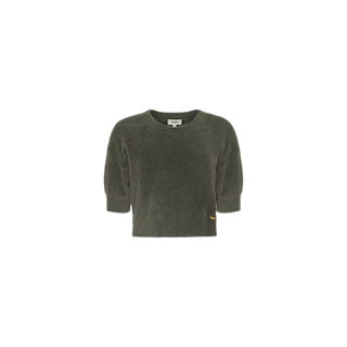 The Guinevere Cropped Pullover is a dark olive green, long-sleeve crewneck sweater featuring a slightly loose, cropped silhouette and a small logo tag near the hem, displayed against a plain white background.