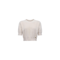 The Guinevere Cropped Pullover, an ultra-soft knit short-sleeve crewneck sweater in cream with a round neckline and a small gold tag near the hem, is displayed on a plain white background.