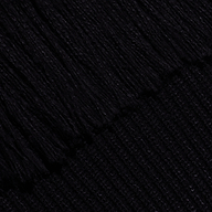 Close-up of the black Maddison Turtleneck, showing the ribbed texture of the cropped collar and the smooth knit of the body.