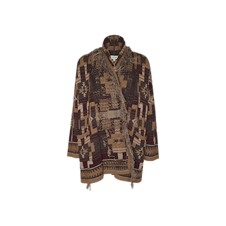 The Jair Cardigan is a shawl-collar sweater showcasing a bold geometric design in brown, tan, and burgundy hues, accented with fringed edges and finished with a belted waist for extra flair.