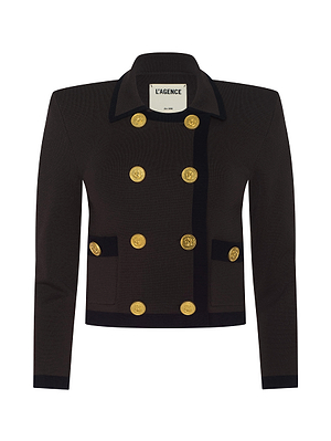 A black Janu Cropped Knit Jacket by L'AGENCE featuring a double-breasted design, gold buttons, black velvet trim, front pockets, and an inner collar label with the brand name.