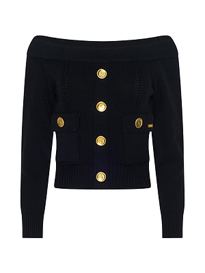 The L'AGENCE Teri Off-The-Shoulder Top is a black cropped knit cardigan with long sleeves, gold front buttons, and two front pockets each detailed with a gold button.