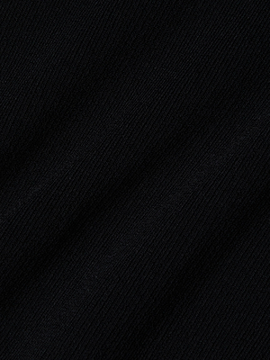 Close-up of the Jennis Mock-Neck Bodysuit by L'AGENCE, featuring black power knit fabric with visible diagonal ribbed texture and subtle folds that create soft shadows.