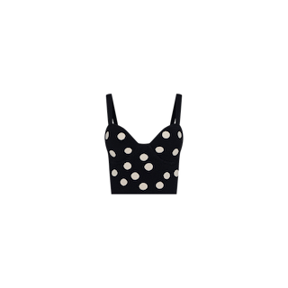 Tula Knit Bra Top in black, designed with jacquard polka dots, thin shoulder straps, and a fitted corset-style silhouette. Displayed on a plain white background.