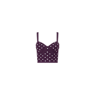 The Tula Knit Bra Top is a dark purple cropped tank top with jacquard polka dots and thin shoulder straps, showcased on a plain white background.