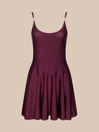 The Lana Flare Knit Dress is a sleeveless, burgundy skater-style day dress featuring thin adjustable straps and a flared stretch knit skirt, shown against a plain beige background.
