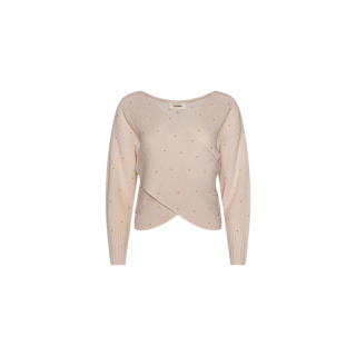 The Antonella Crossover Sweater is an oversized, light pink V-neck knit with long sleeves, featuring a wrap-style front, subtle ribbed texture, and small yellow polka dots scattered throughout. The sweater is displayed against a plain white background.