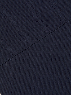 Close-up of the Mary Corset Midi Dress in dark navy blue, featuring visible stitching and a horizontal seam that highlight the textured detail and sculpted fit.