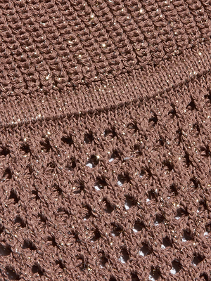 Close-up of the Tracy Bralette Top’s brown pointelle knit fabric, featuring sparkly thread, with a dense, tight weave on top and an open, lacy weave with small holes on the bottom.