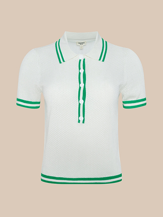 Introducing the Calvin Polo Top: a white featherweight knit tennis polo shirt featuring short sleeves and green stripes accenting the collar, sleeve cuffs, and hem. This stylish piece showcases a button-up front with green trim on a beige background and is finished with a signature logo patch for distinctive flair.