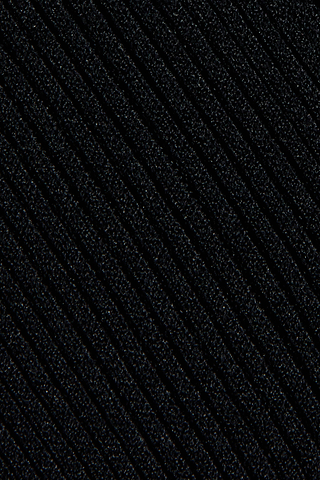 Close-up of black ribbed fabric with diagonal textured lines creating a striped pattern, perfect for the Conan Knit Pant.