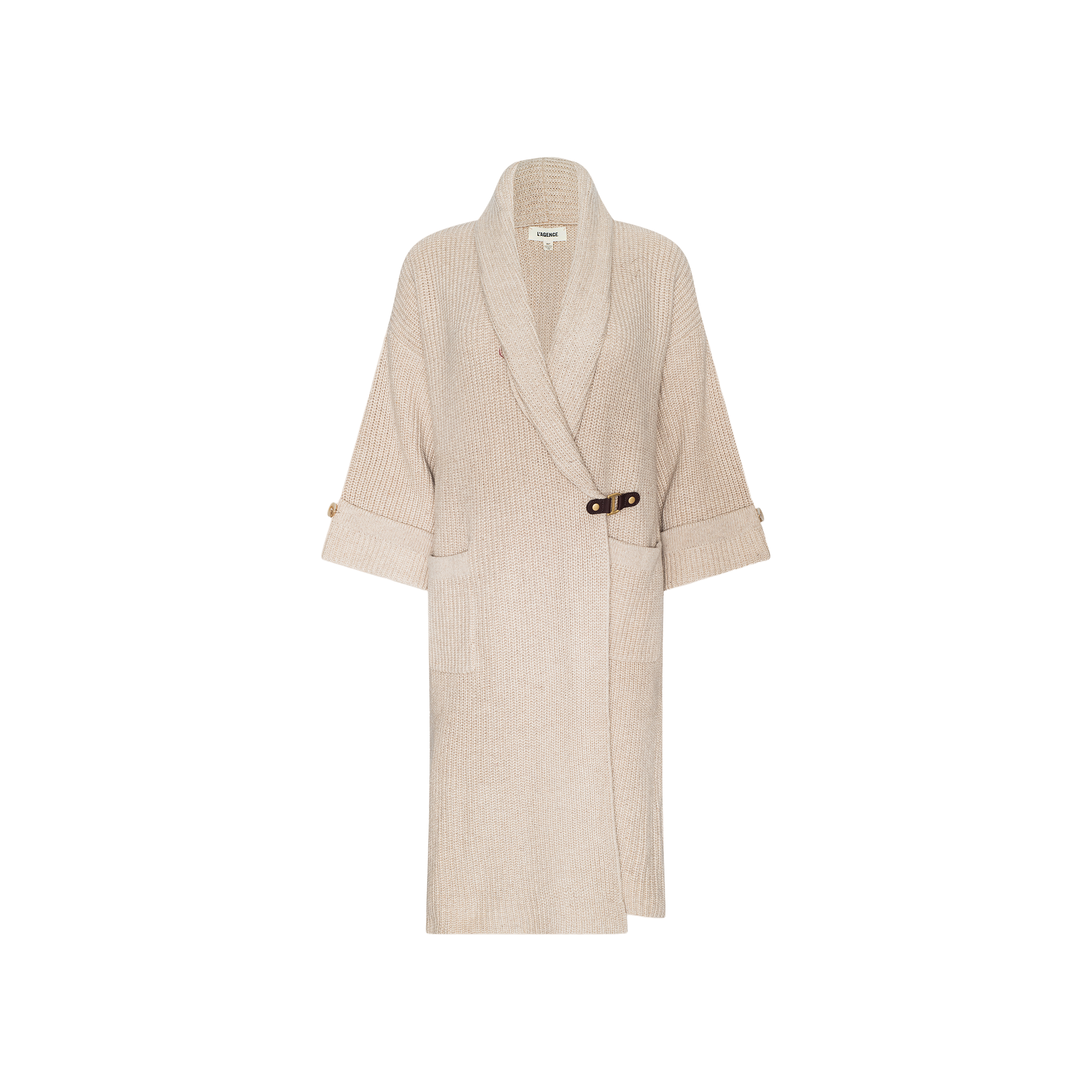 The Orielle Cardigan is a long, beige sweater featuring rolled-up sleeves, spacious front pockets, and a side buckle closure, shown against a white background.