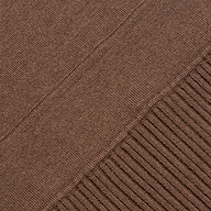 The Solaire Knit Dress is a brown fitted midi dress featuring a smooth knit section that transitions into a vertical ribbed pattern.
