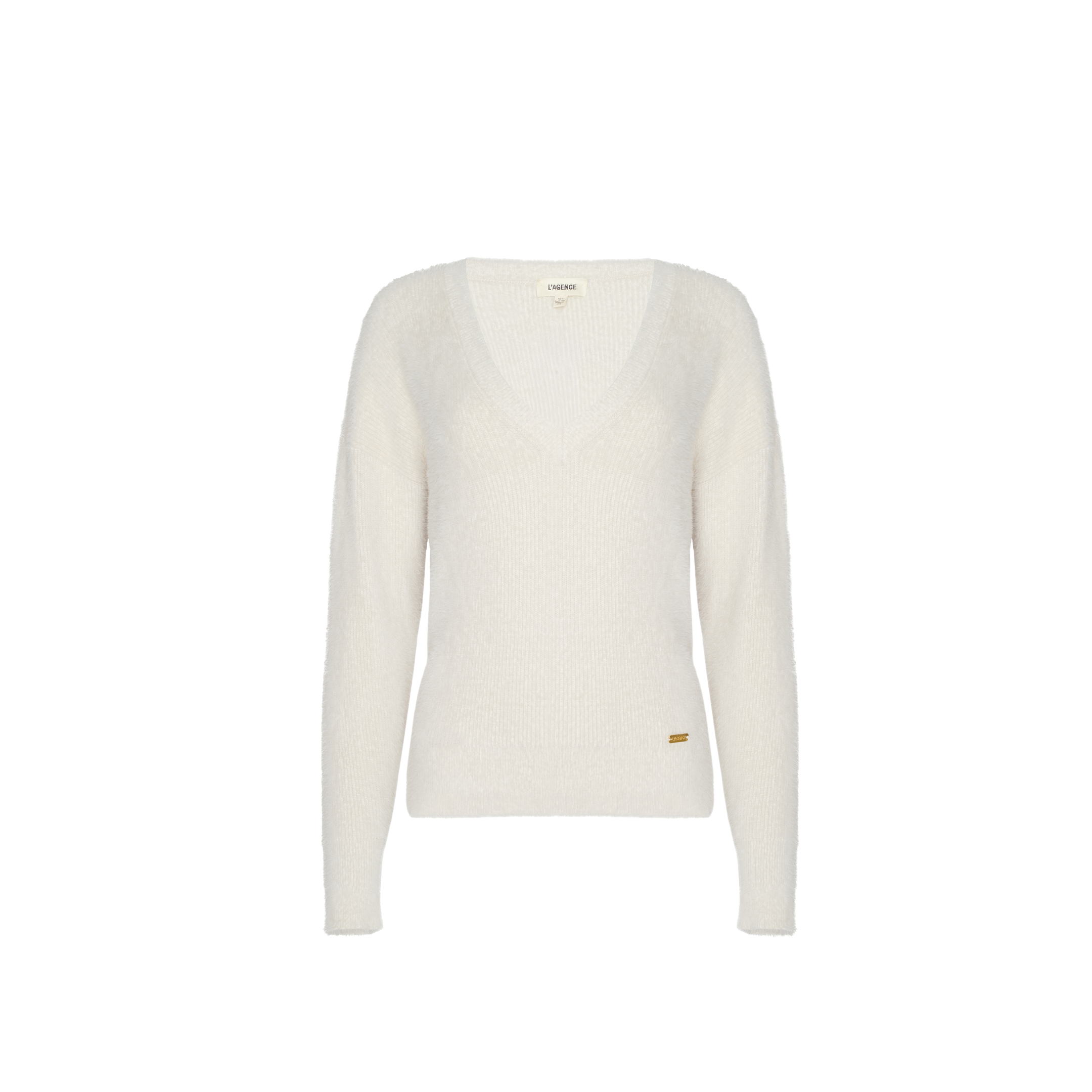 Soft knit Korinna Pullover V-neck sweater in white with long sleeves and a small gold-tone metal emblem at the left hip.
