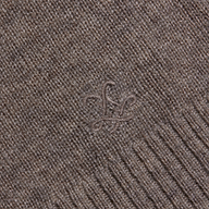 Close-up of the Malone Cashmere Cardigan, showcasing its brown knitted cashmere fabric with a subtle embroidered design and ribbed edging.