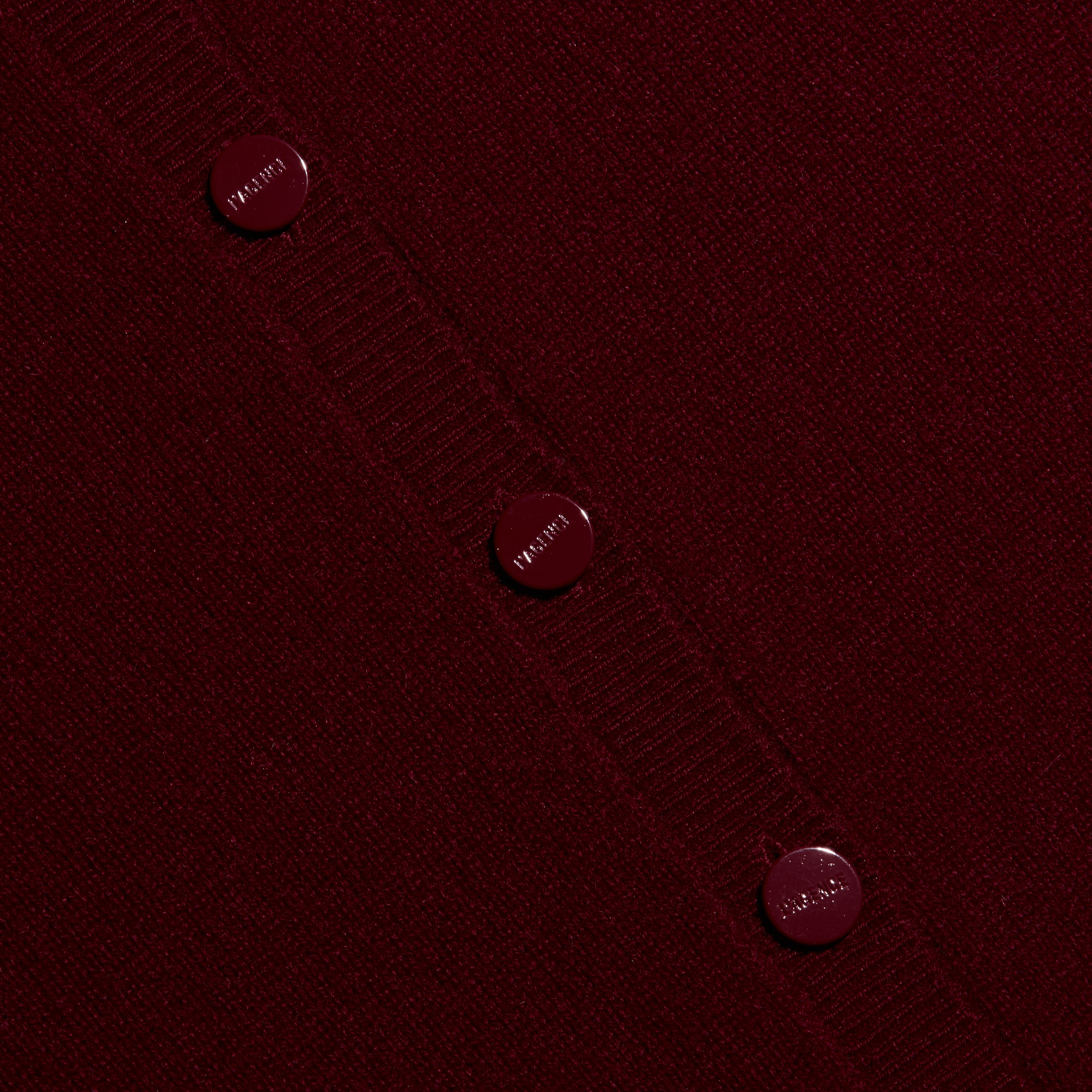 Malone Cashmere Cardigan in cherry red with a crewneck and matching buttons.