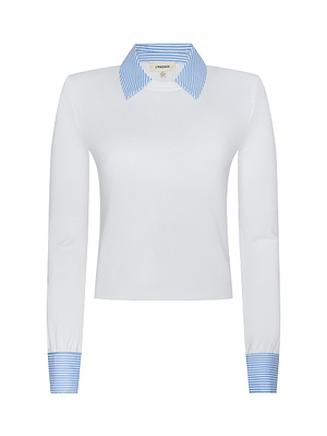 The April Poplin Collar Pullover is a white long-sleeve blouse featuring a striped poplin collar, matching striped cuffs with removable cufflinks, showcased against a plain background.