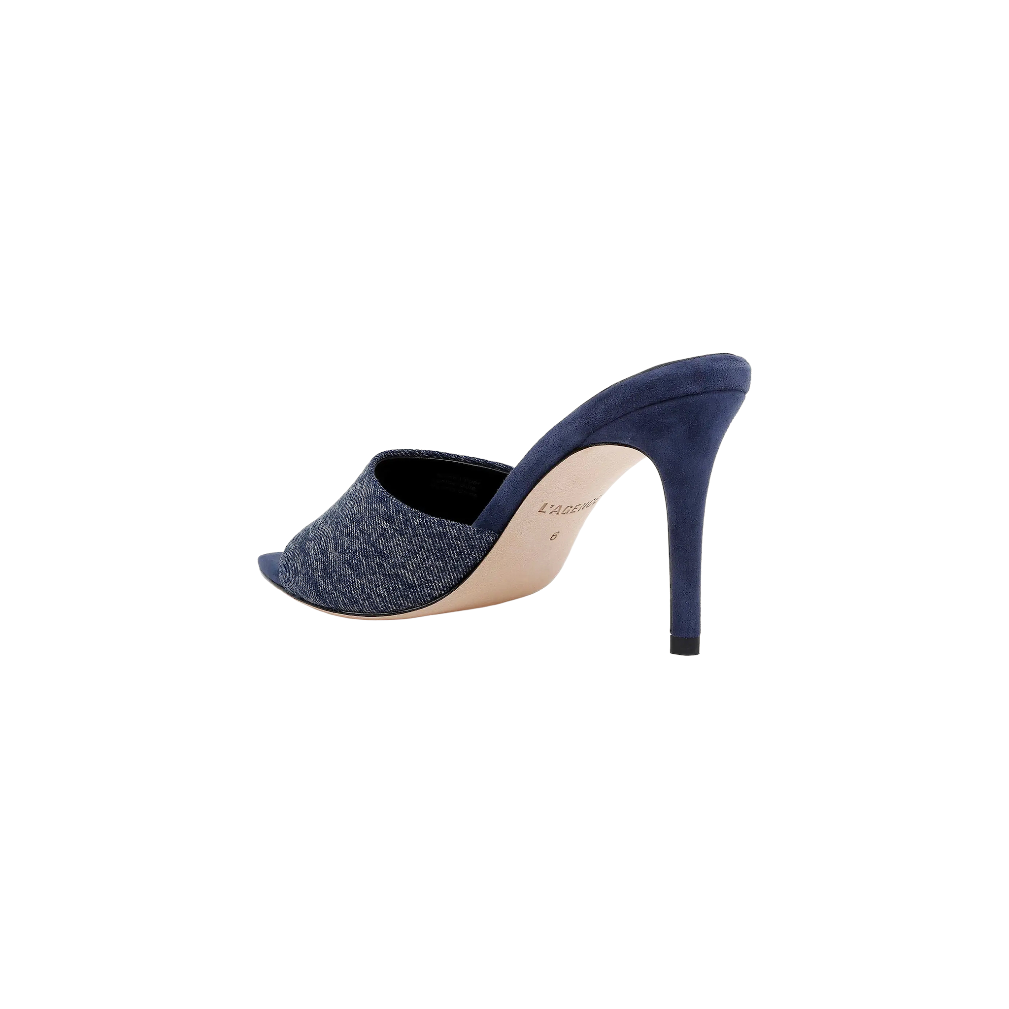 The Lolita Denim Open-Toe Mule, featuring a denim upper and a blue suede stiletto heel, is shown from the side and slightly behind against a white background.