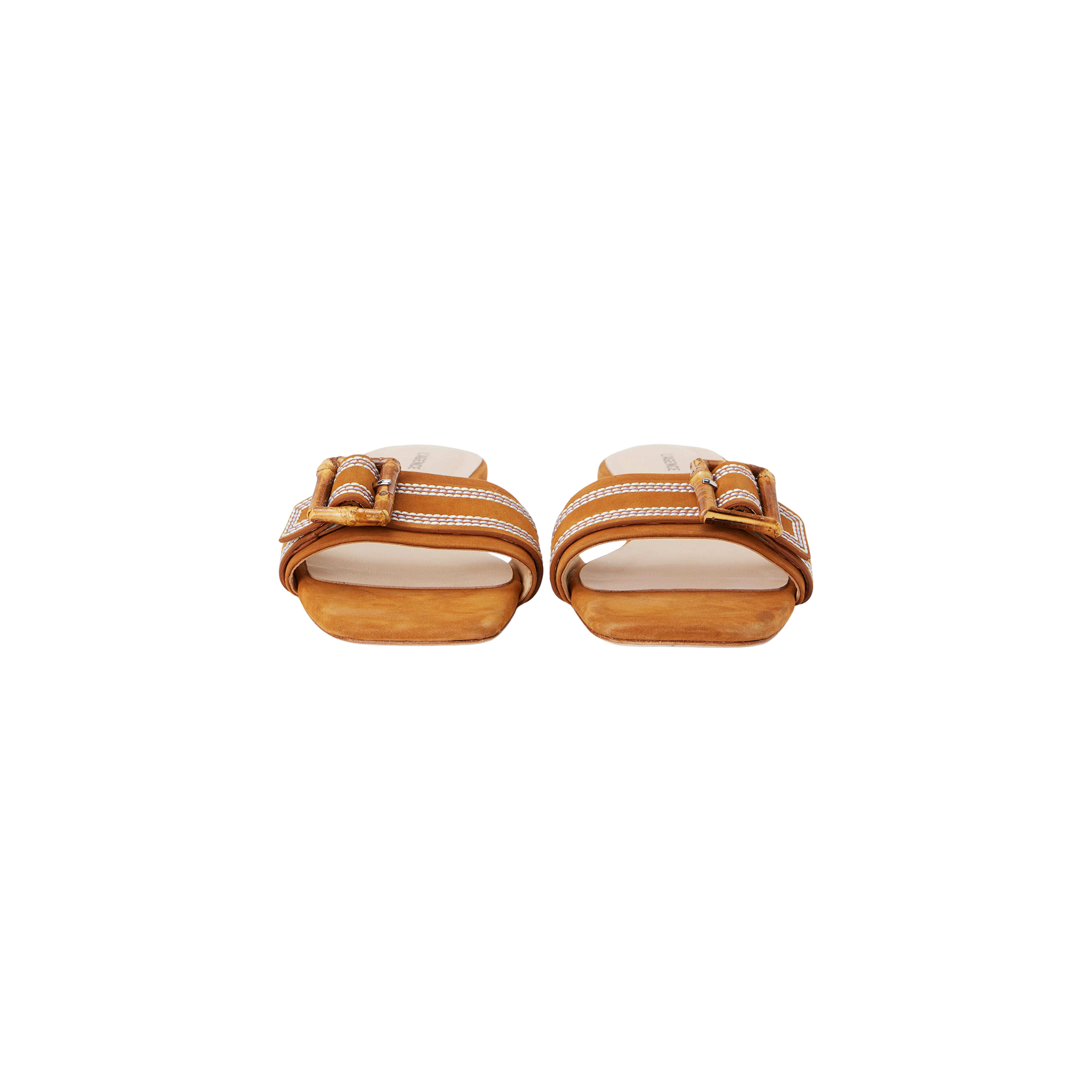 The Aurelie Buckle Sandal, a pair of brown suede slide sandals featuring bamboo buckles and white stitching, is shown from the front on a plain white background.