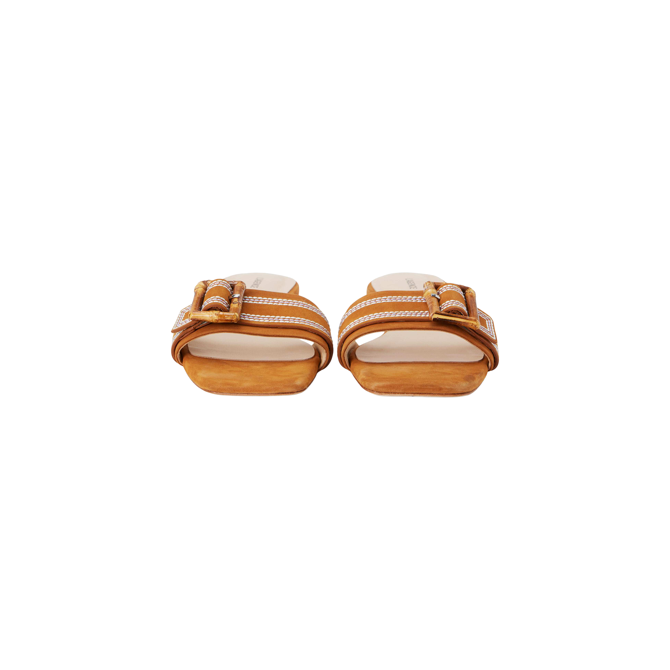 The Aurelie Buckle Sandal, a pair of brown suede slide sandals featuring bamboo buckles and white stitching, is shown from the front on a plain white background.