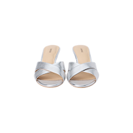 A pair of Aveline Kitten-Heel Sandals in silver metallic leather, featuring an open toe, strappy vamp, and beige insoles, displayed against a white background.