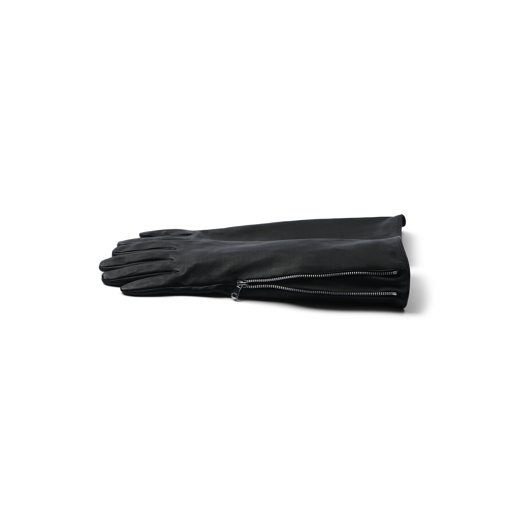 A pair of Carmen Gloves, crafted from long black lambskin and featuring zippers near the wrists, are neatly stacked on a white surface.
