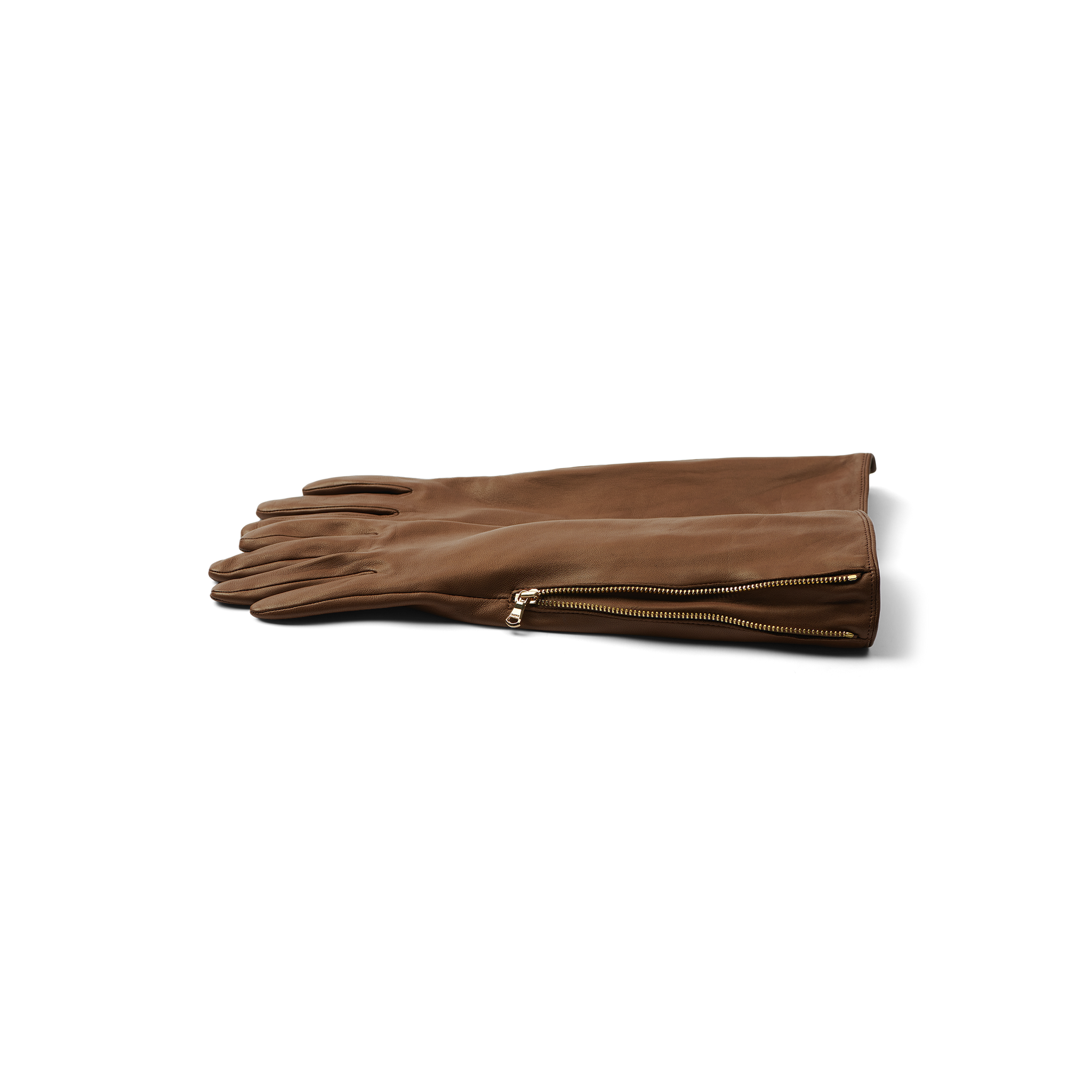 A pair of Carmen Gloves made from brown lambskin with gold zippers near the wrists, displayed flat on a white background.