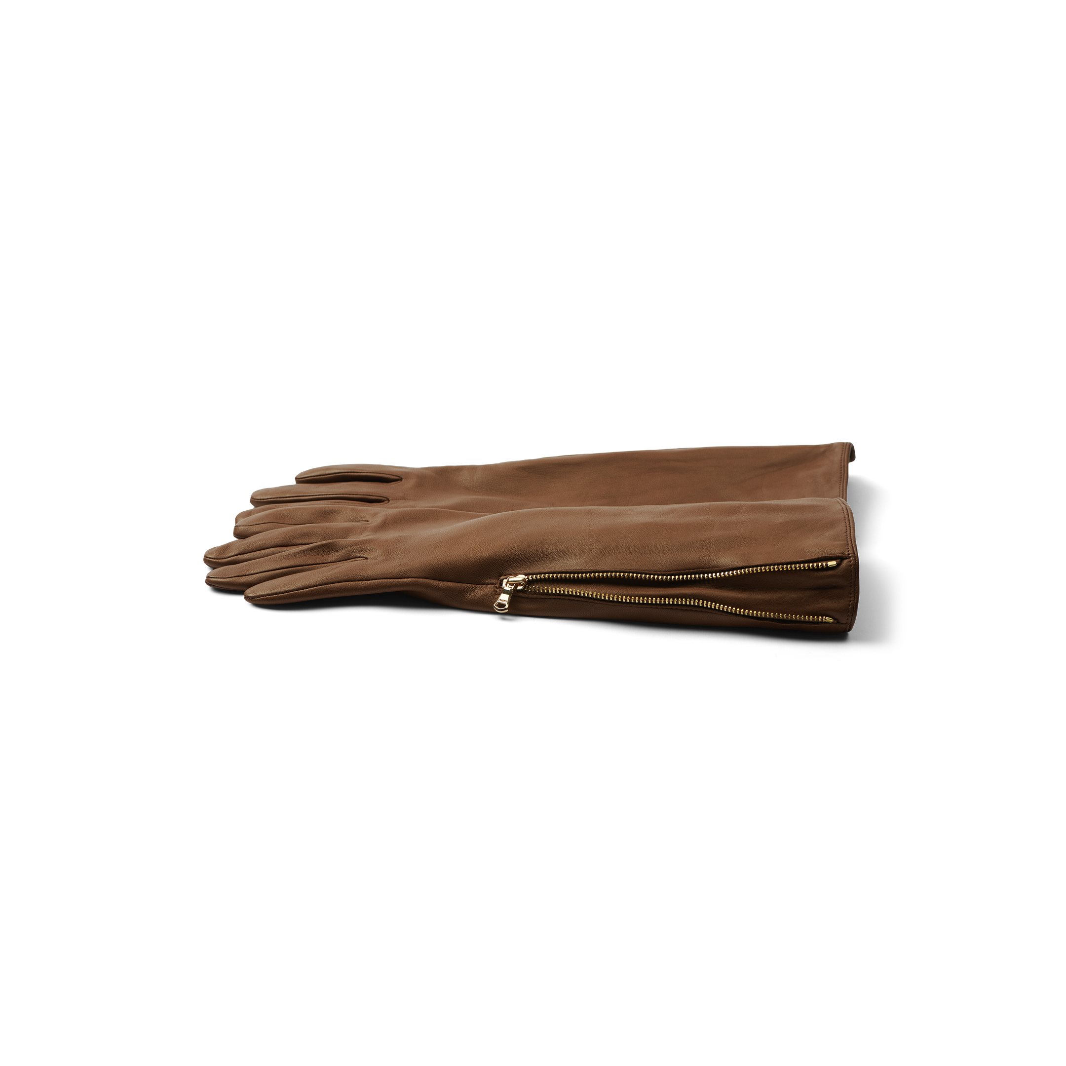 A pair of Carmen Gloves made from brown lambskin with gold zippers near the wrists, displayed flat on a white background.