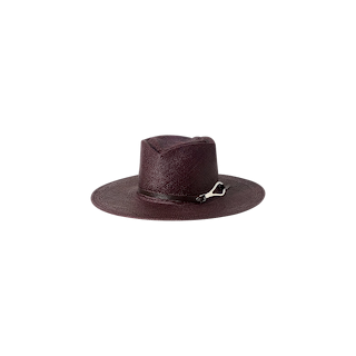 The Estella Fedora is a dark burgundy wide-brimmed hat with a flat top and a decorative leather band featuring a metallic accent, handcrafted in LA and photographed against a plain white background.