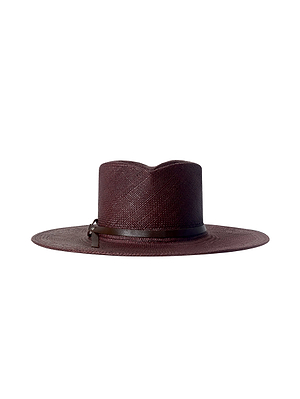 The Estella Fedora by L'AGENCE is an espresso-colored, wide-brimmed straw hat featuring a flat crown and matching leather band, handcrafted and shown on a white background.