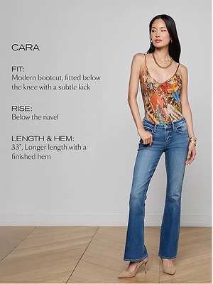 A woman wearing a colorful sleeveless top and blue bootcut jeans stands in heels. Text beside her describes the jeans: modern bootcut fit, rise below the navel, 33 length, and finished hem.