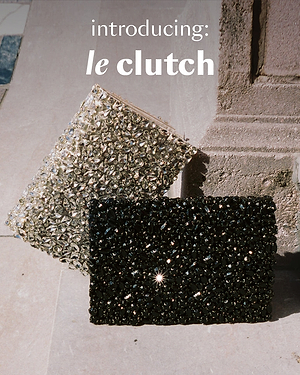Two glittery clutch bags on a stone surface with 'introducing: le clutch' text.