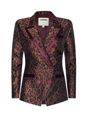 Leopard print blazer with red accents on a white background