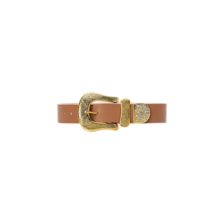 Experience sophistication with the Ximena Belt – a tan Italian leather accessory handcrafted in LA, showcasing a large, ornate gold buckle and elegant gold detailing near the holes. Displayed on a white background, this Western statement belt elevates any outfit with its effortless style.