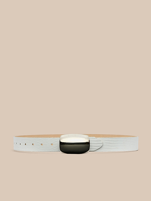 The Milou Belt features handcrafted light gray leather with a subtle texture and a shiny silver-plated buckle, displayed against a plain beige background.
