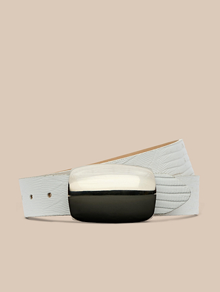The Milou Belt, handcrafted in LA from premium Italian-sourced materials with a white lizard-embossed finish, features a shiny rectangular silver and black buckle and is displayed against a plain beige background.