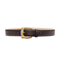 The Marcaeu Belt is a dark brown Italian leather accessory, handcrafted in LA, featuring a decorative gold-plated buckle with an intricate braided design, displayed against a plain white background.