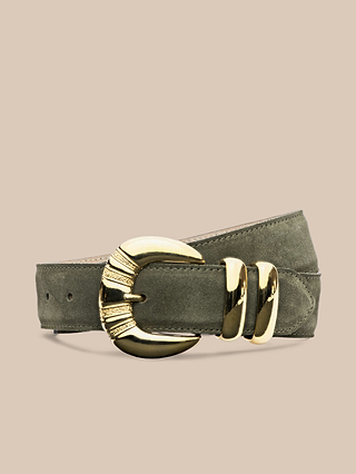 The Yarros Belt, crafted from green Italian suede, features a striking large gold-plated buckle and two coordinating gold loops. Presented against a simple beige backdrop, this belt brings refined sophistication to any outfit.