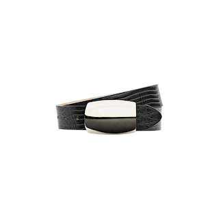 The Milou Belt, featuring a black lizard-embossed design and a sterling silver-plated rectangular buckle, is shown coiled in a loop against a plain white background.