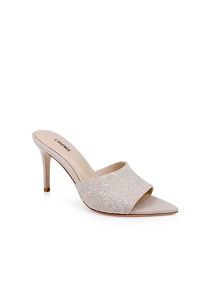 The Lolita Linen Open-Toe Mule is a beige slip-on mule with an open toe, high stiletto heel, and embroidered linen floral lace on the upper. The L’AMOUR name appears on the insole.