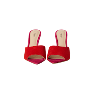 The Lolita Suede Open-Toe Mule features red and pink suede uppers, stiletto heels, and beige insoles, shown from above on a white background.