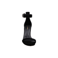Front view of the Gisele Suede Sandal in black, featuring a heeled design with an ankle strap and a round buckle, displayed on a plain white background.