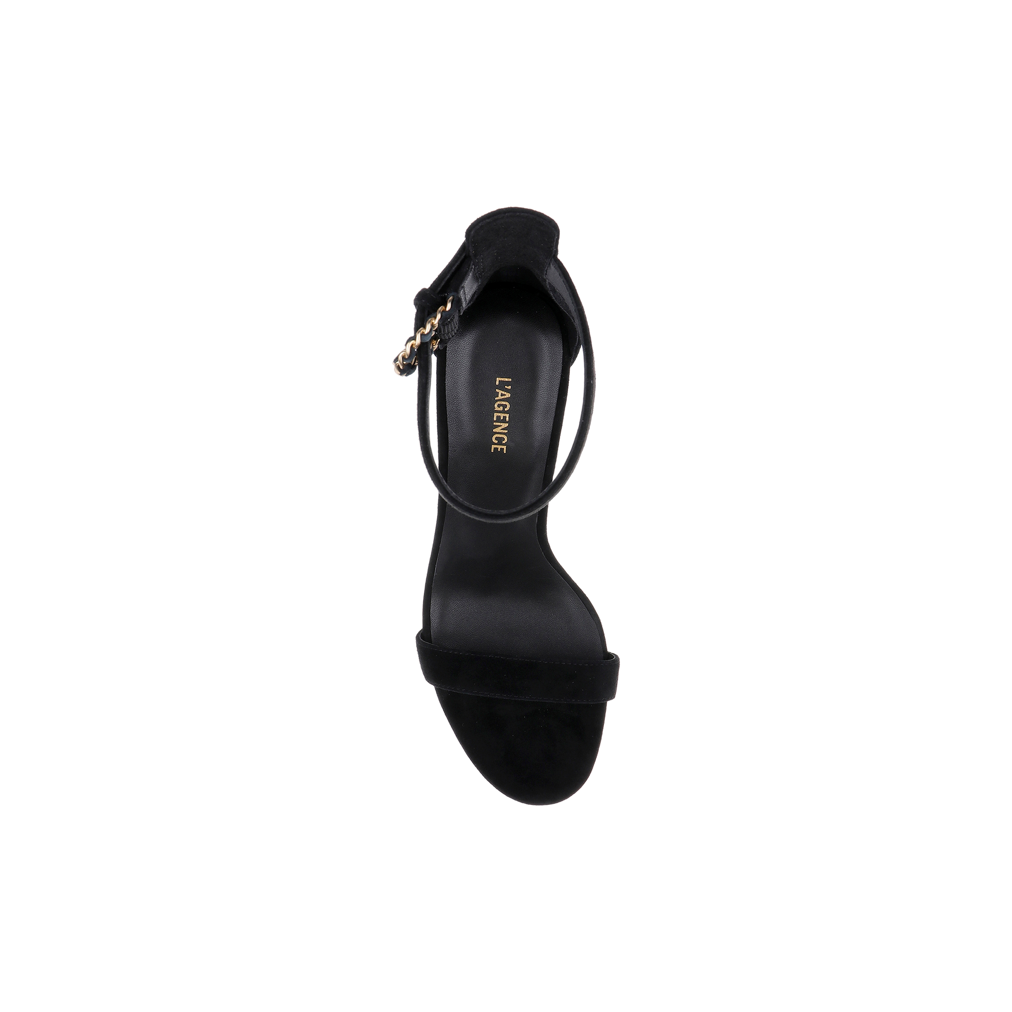 Top view of a single Gisele Suede Sandal in black with an ankle strap and gold buckle, featuring the brand name LAURENCE printed in gold on the insole, set against a white background.