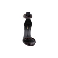 The Gisele Leather Sandal is a black high-heeled shoe crafted from crocodile embossed leather, featuring an ankle strap and a gold buckle, shown from the front against a plain white background.