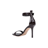 A Gisele Leather Sandal in black crocodile-embossed leather, featuring a high heel, ankle strap, and open toe, displayed against a plain white background.