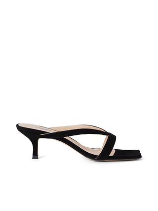 The Oceane Kitten Sandal is a black open-toe sandal featuring a chic square toe and a single wide strap across the front, crafted from luxurious black suede and displayed in side profile on a white background.